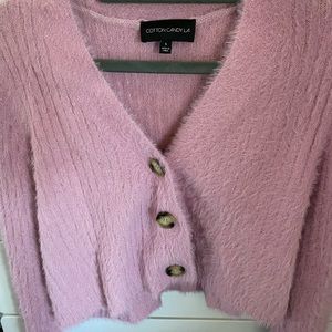 pink fuzzy sweater